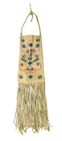 Finely beaded buckskin bag with interesting seed bead design, with great color and long fringe.