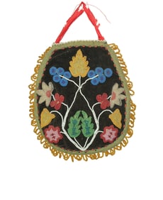 American Indian beaded bag with colorful floral pattern on velvateen and measuring 7" in length.
