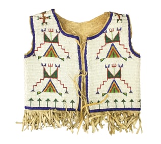 Fabulous fully beaded turn-of-the-century vest on hide, with outstanding geometric design on white