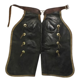 With character and cowboy flavor, this pair of Colorado made chaps shows pleasing aged color with
