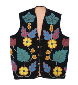 Eye popping American Indian vest, with beautiful brightly beaded floral pattern on velvateen with