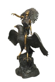 With great presence, this large bronze depicts an Indian maiden atop a boldly posing eagle.