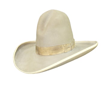 This outstanding hat displays a terrific cowboy profile with its Montana Peak shape, great color, 1