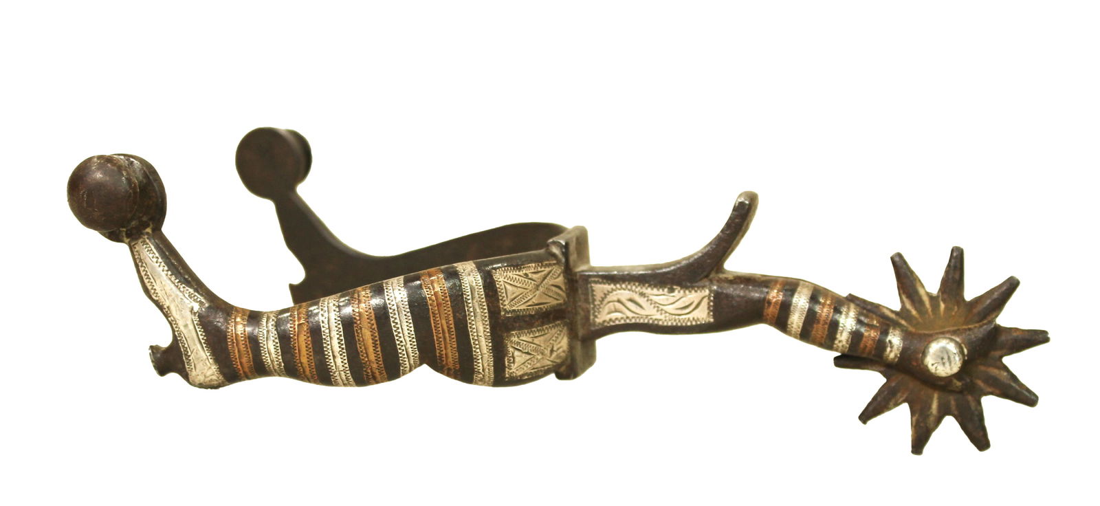 G.S. Garcia Single Spur: This phenominal G.S. Garcia spur is of his earliest work, and the shaped lady leg is one of his most rare patterns. It is single inlaid with silver and copper, displaying a long leg shank, radical cha