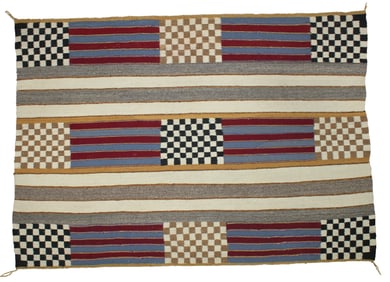 An exceptional boldly colored Second phase Navajo weaving with incredible presence and uncommon