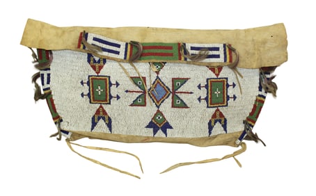 An amazing oversized brain tanned bag with full coverage beaded pattern of brilliantly colored
