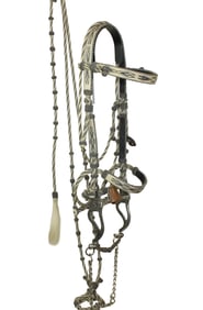A vintage Montana State Penetentiary hitched horsehair bridle with highly detailed black and white