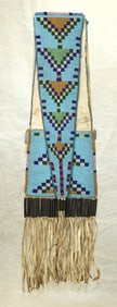 Stunning and important 1880's Blackfeet tobacco bag. Finished on brain tanned hide, the undecorated