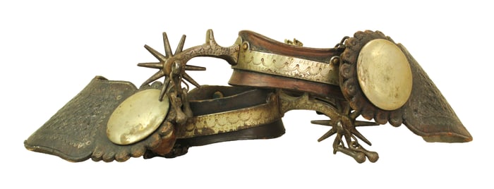 Extremely uncommon pair of early Buerman drop-shank spurs with rare leather liners and terrific