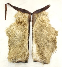 Pleasing pair of desirable white angora shotgun style chaps with stylish long twisted hair, and