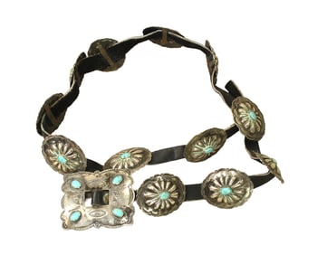 A nice old sterling silver concho belt with 12 scalloped 1 1/2" turquoise centered conchos