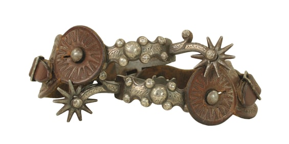 Eye catching pair of single inlaid pair of decorative spurs with classic Estrada style to include