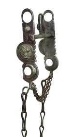 Extra clean chased iron tall halfbreed bit mounted with three dimensional buffalo heads and horns.
