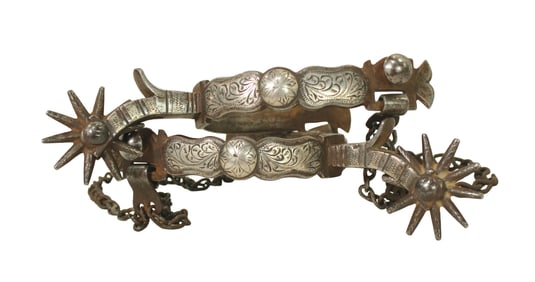 Pleasing late 1800's pair of single inlaid spurs with wonderful scroll engraving, pronounced