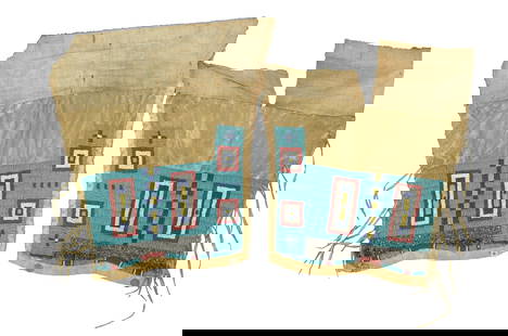 Terrific pair of Northern Plains leggings, heavily beaded on hide with an interesting light blue: Terrific pair of Northern Plains leggings, heavily beaded on hide with an interesting light blue background and incorperated steelie beads.