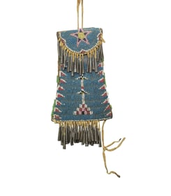 An extra nice Northern Plains beaded bag with uncommon colors, a great pattern and wonderful fringed