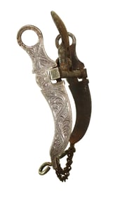 A seldom seen loose jaw bit with exagerated spoon mouth piece, beautifully full silver overlaid