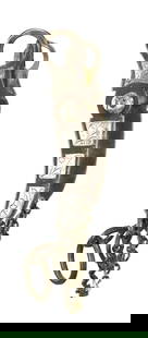 An early maker marked banana cheek halfbreed iron bit with stylishly engraved silver panels, and: An early maker marked banana cheek halfbreed iron bit with stylishly engraved silver panels, and silver domes.