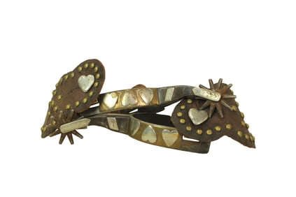 Desirable double mounted four heart pattern spurs using a two color design, swinging heart buttons