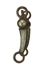 A heavy iron halfbredd bit with charcteristic Canon City leaf and vine engraved silver, highlighted