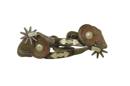 Single mounted Texas style spurs with fine engraving and wonderful condition. Completed with nice
