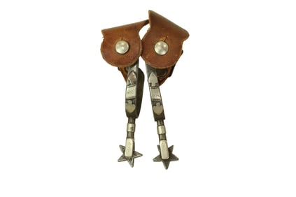 A rare pair of double mounted McChesney's with finely twisted wire, straight shanks and five point