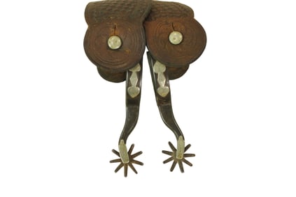 Texas style single mounted spurs with a good look, and great original straps.