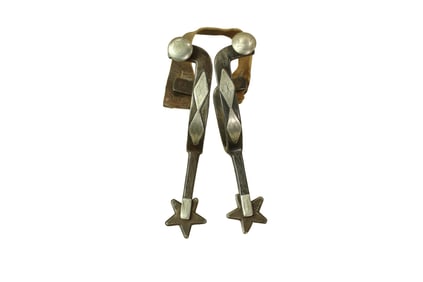 Stylish pair of single mounted straight shank spurs with delicately engraved shanks and five point