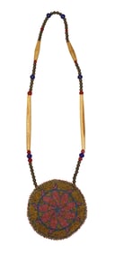 A stunning Indian hairpipe strung necklace with beautifully beaded madallion, measuring 4" in