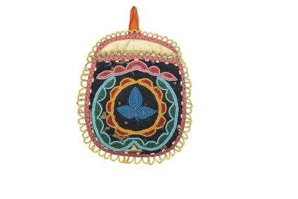 Intricately beaded Native American bag on velvateen, with decorative border and great colors.