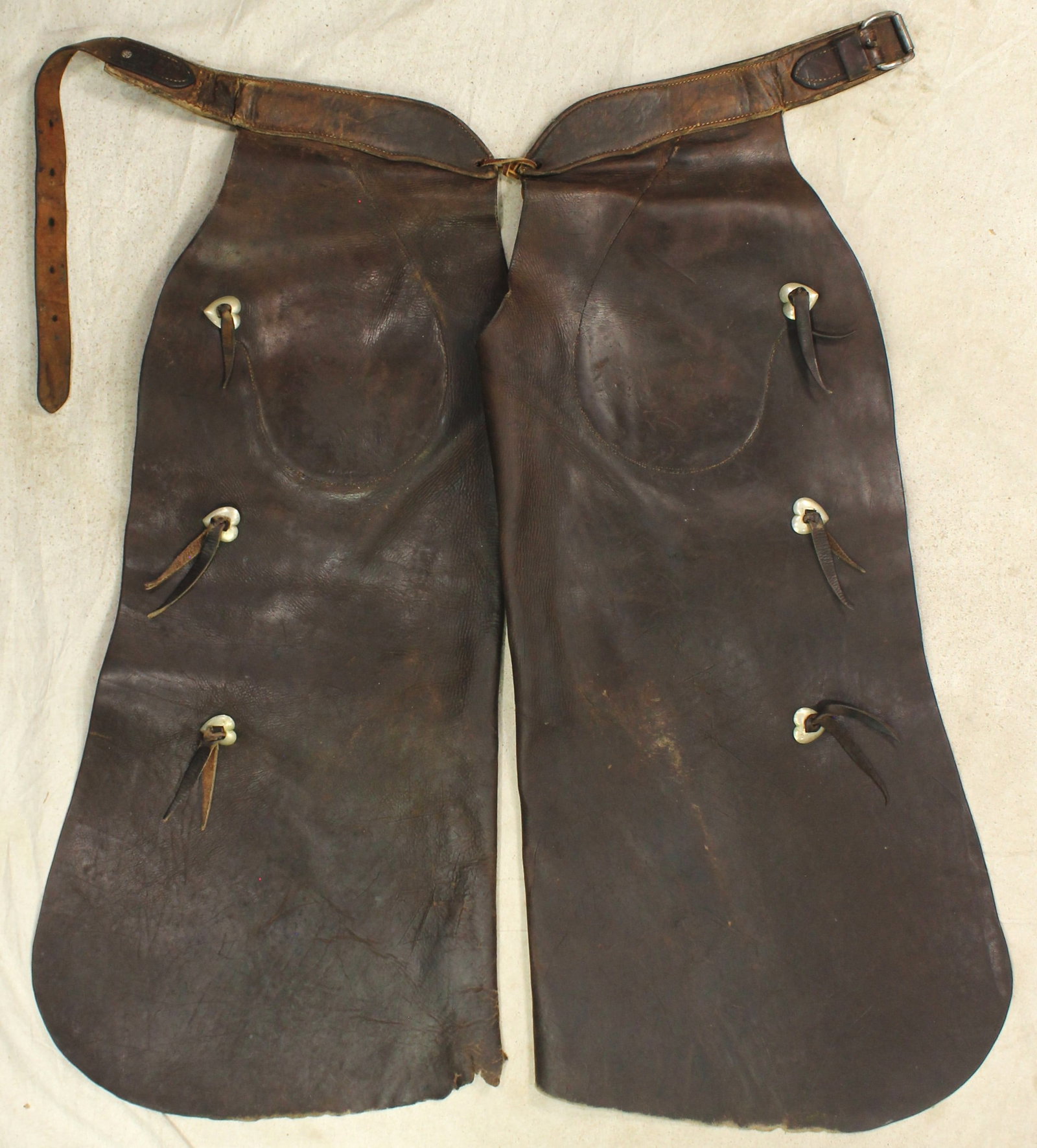 Heiser Batwing Chaps: Classic pair of maker marked Colorado made batwing chaps, showing rich color and condition.