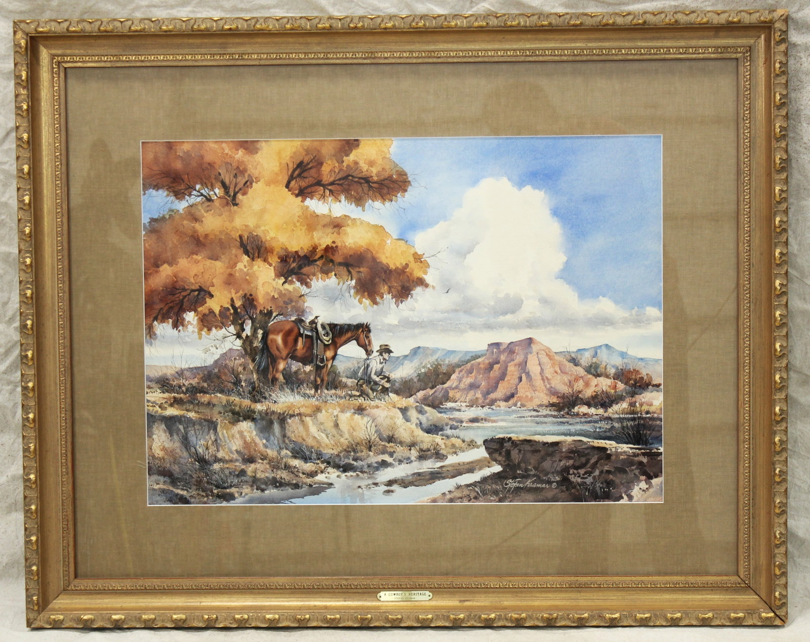 Stephan Kramar Painting: Large brightly colored Western watercolor print with a pleasing cowboy scene. Professionally framed and matted. Signed in lower right and measuring 41”x 32”.