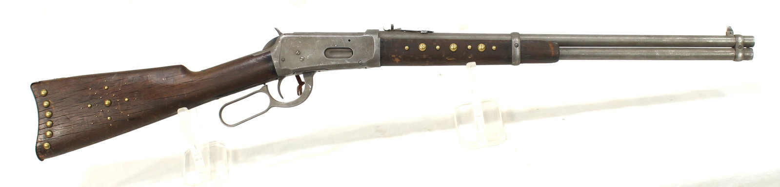 Movie Used Winchester Carbine: Used in the movie Geronimo, this attractive lever action 1894 carbine has great Indian tacked decoration, and displays pleasingly worn wood, showing a nice overall authentic style look. Serial