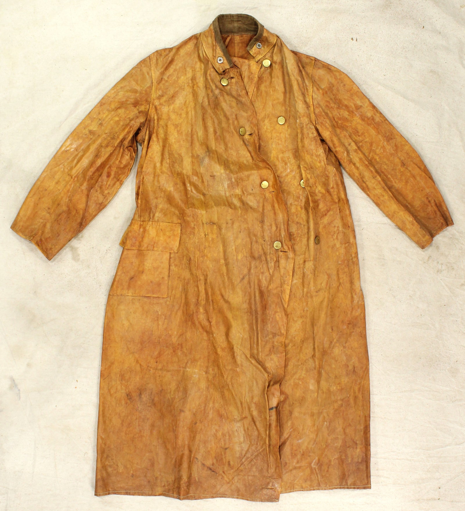 Antique Cowboy Slicker: Long oil cloth duster coat made by the famous Fish Brand. Showing terrific color, and little or no use.