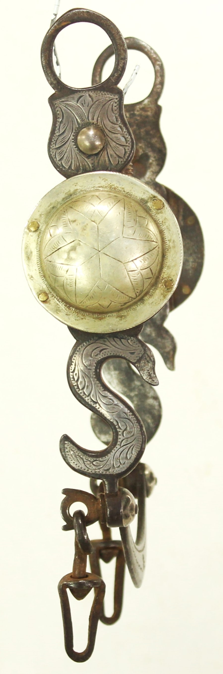 Early L.D. Stone Snake Bit: An intriguing very early halfbreed bit, with very desirable snake pattern cheeks, oversized conchos, tall halfbreed mouthpiece and attractive lip bar. Beautifully maker marked inside cheek.