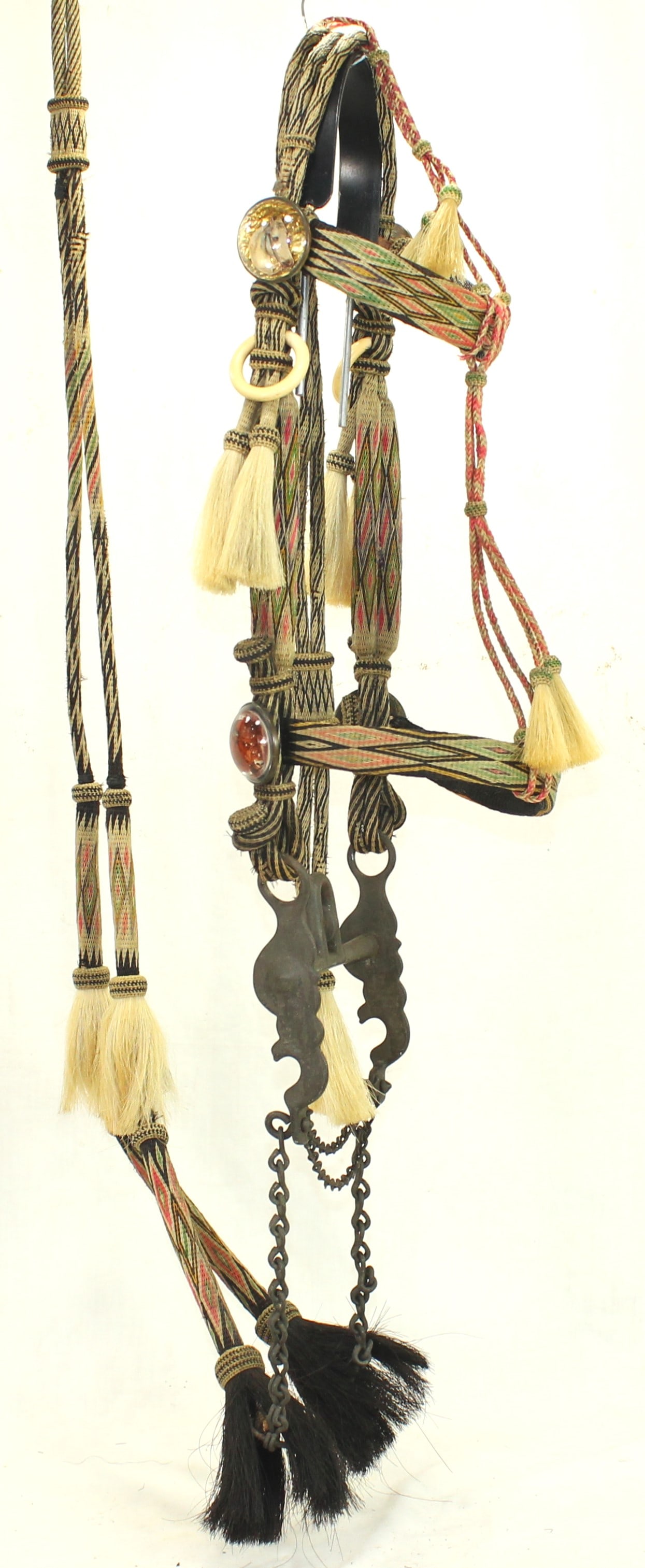 Unique Walla Walla Horsehair Bridle: An exceptional Walla Walla bridle, comprising of seven brilliant colors with a strong presence of rare colors and dazzling pattern of hitched geometric design, 10 tassels, attractive glass rosettes,