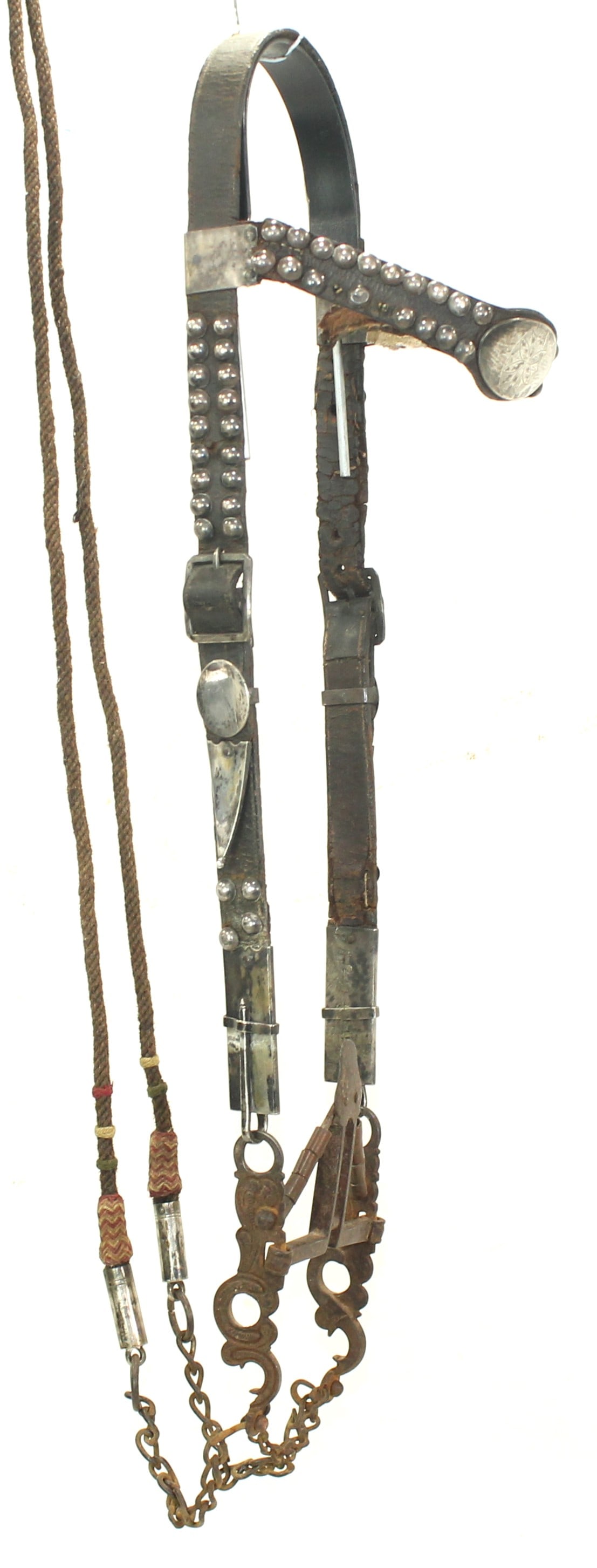 Mexican Silver Bridle: An important mid-19th Century bridle with great style and dazzling silverwork, to include silver buttons, browband medallion, beautiful bit hangers, great period braided reins, and 1850’s
