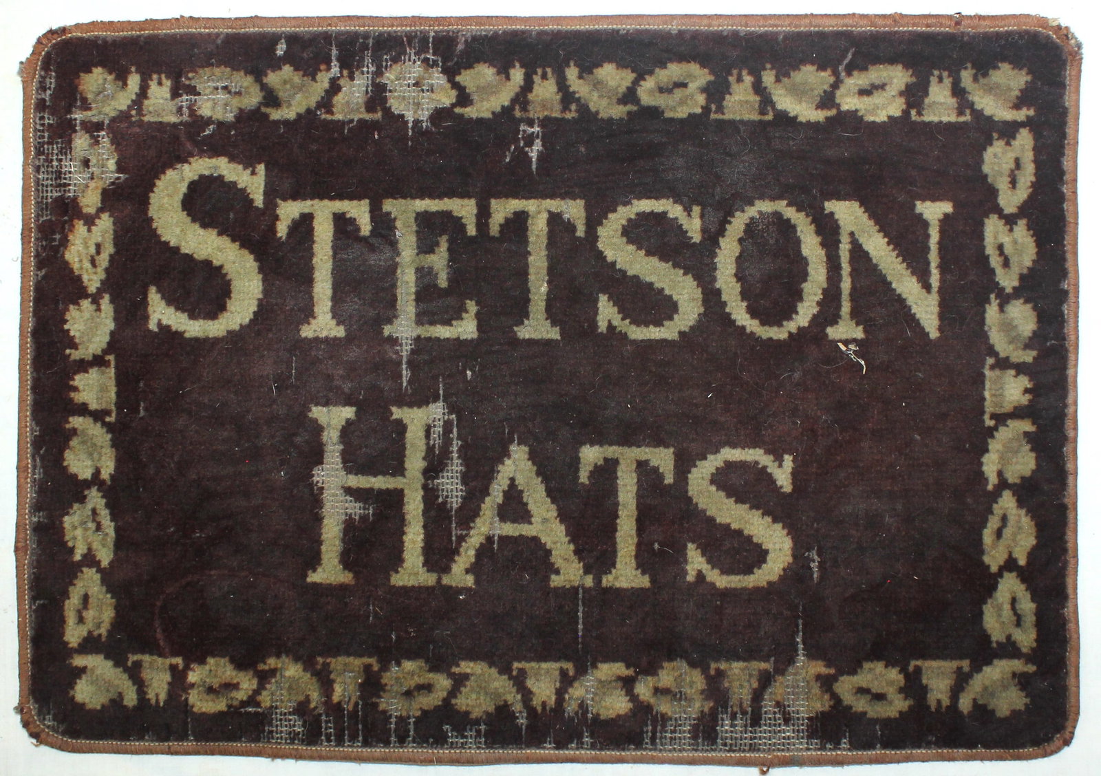 Stetson Counter Pad: A seldom seen vintage counter pad of thin carpet like material, stating “Stetson Hats” in its design. Very appealing and in nice condition. Measures 12”x 18”.