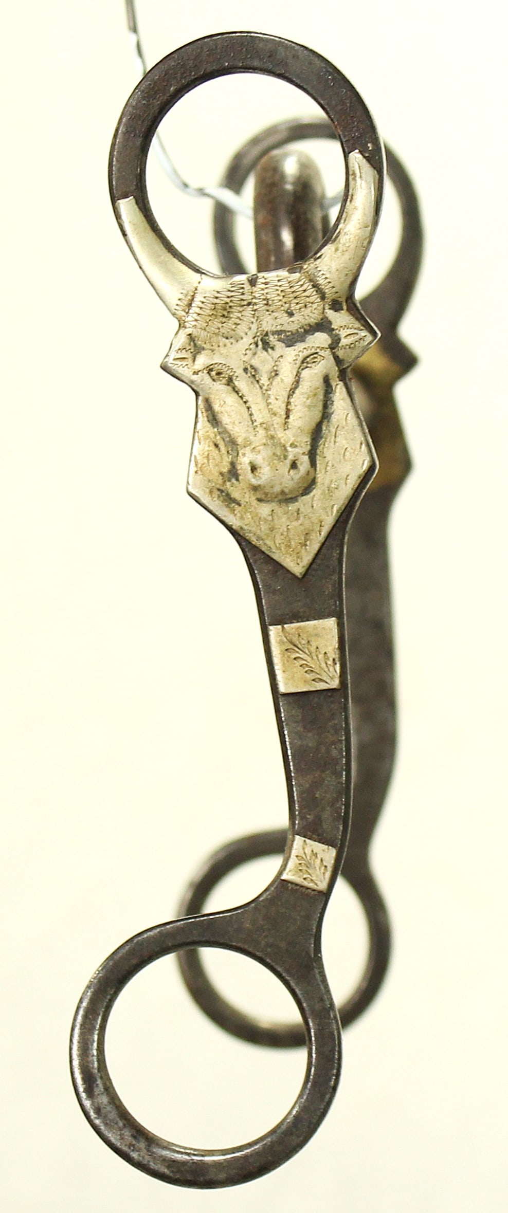 Kelly Bro's Steerhead Bit: Hard to find Kelly Bro's bit with wonderful three dimensional steerhead, in excellent condition with traces of original blue showing, and nice maker's mark.