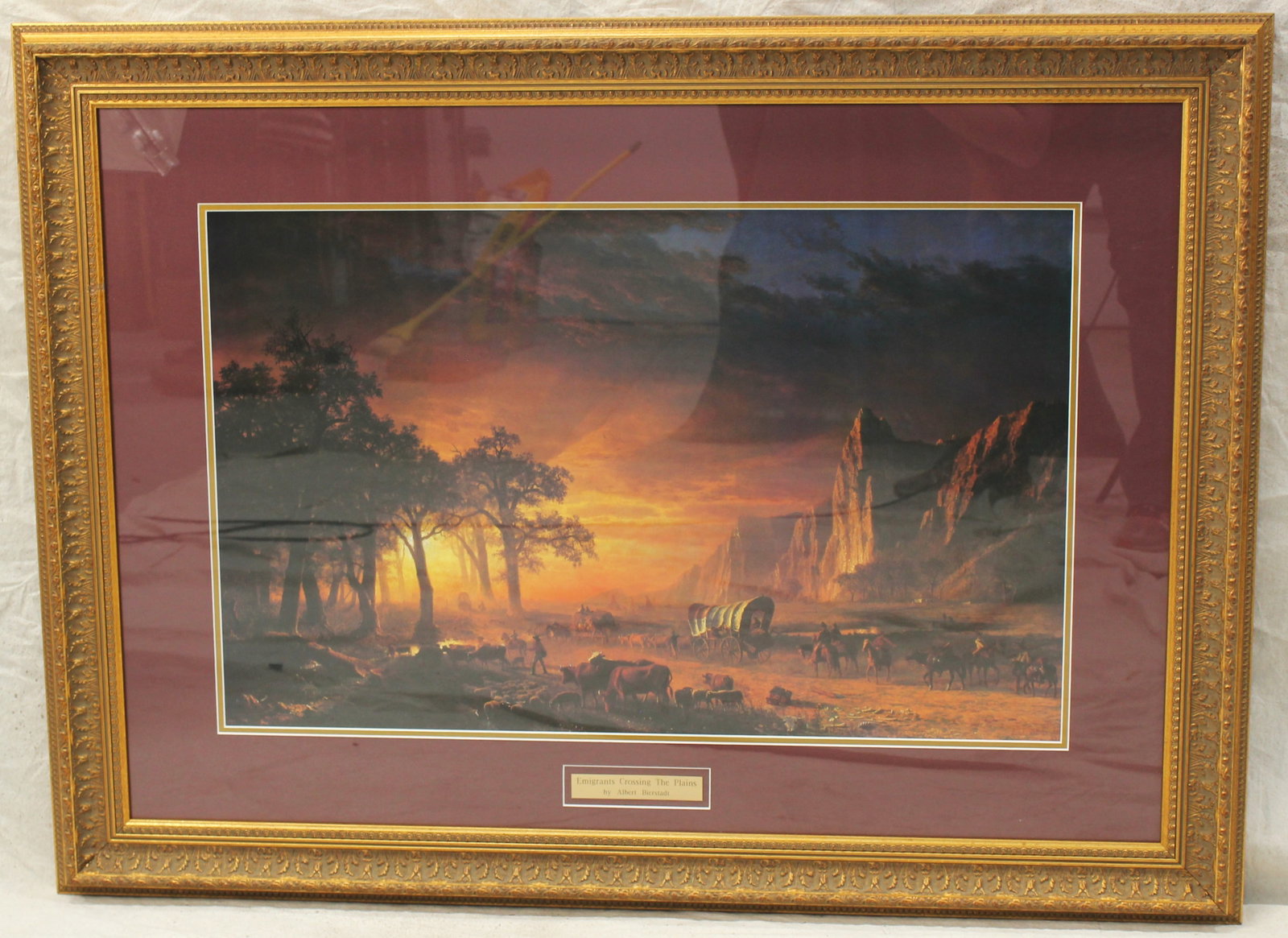 Albert Bierstadt Western Print: A nicely done print of Albert Bierstadt's image titled "Emigrants Crossing the Plains". Professionally framed amd measuring 45 1/2" x 34".