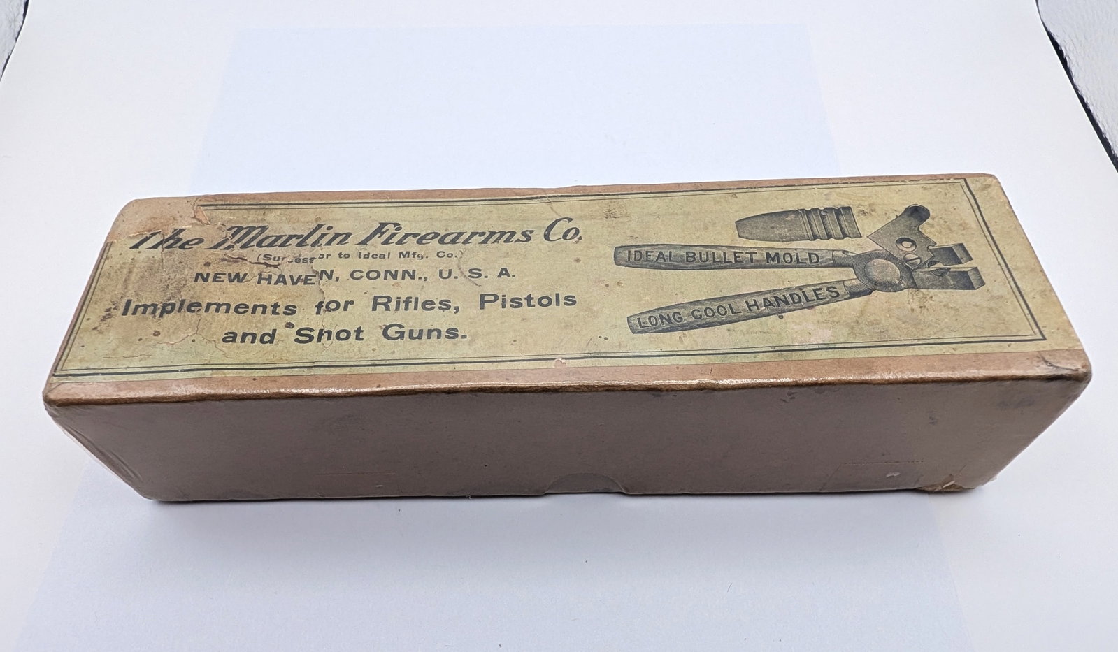 Original Marlin Mold Box: A super nice original Marlin bullet mold cardboard box with a fantastic picture label. In exceptional condition. From the Leland Clapp collection.