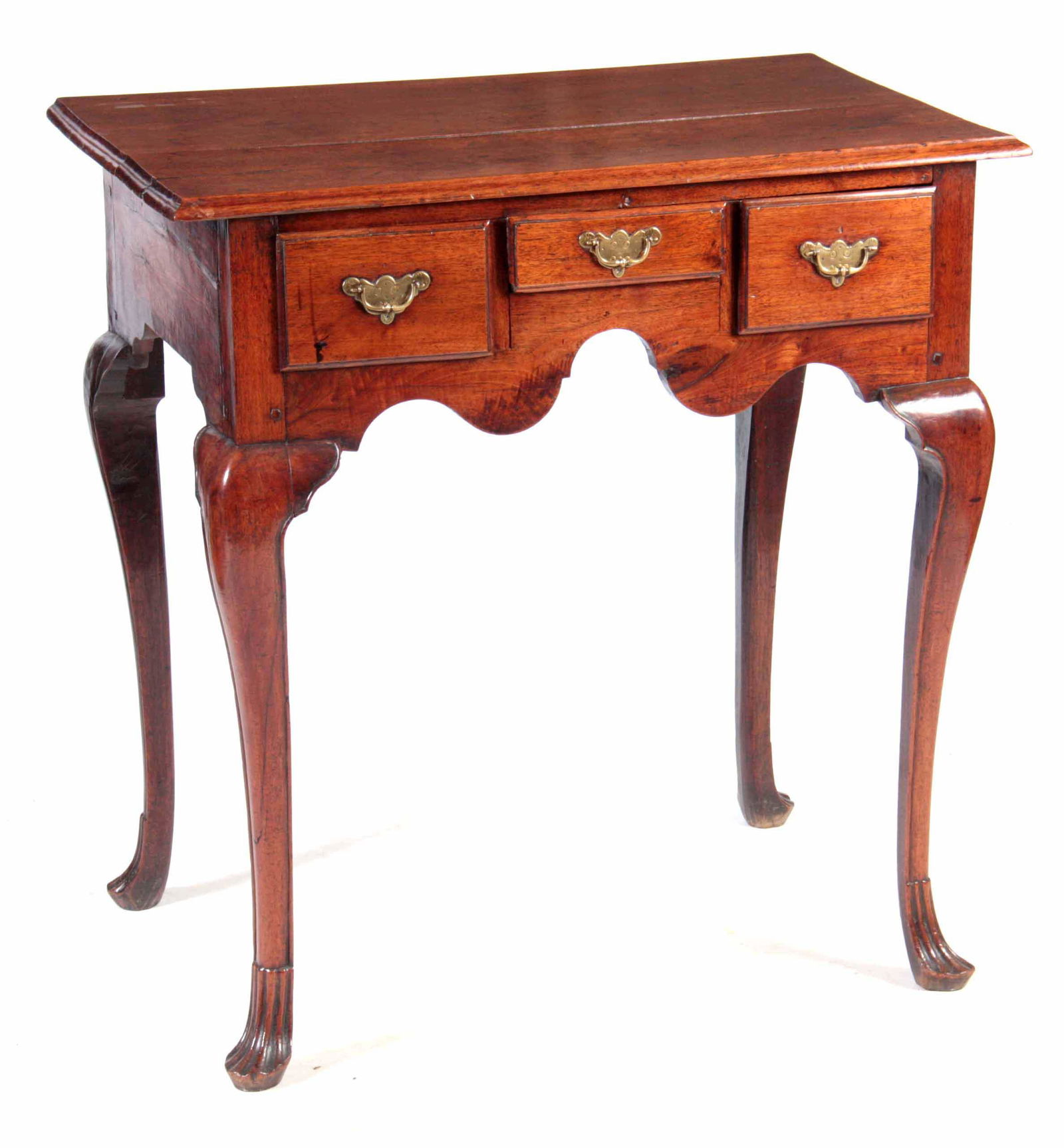 AN UNUSUAL SOLID WALNUT EARLY 18TH CENTURY LOWBOY: AN UNUSUAL SOLID WALNUT EARLY 18TH CENTURY LOWBOY POSSIBLY AMERICAN with moulded edge top above three frieze drawers fitted with engraved solid brass plate handles; standing on high cabriole legs with