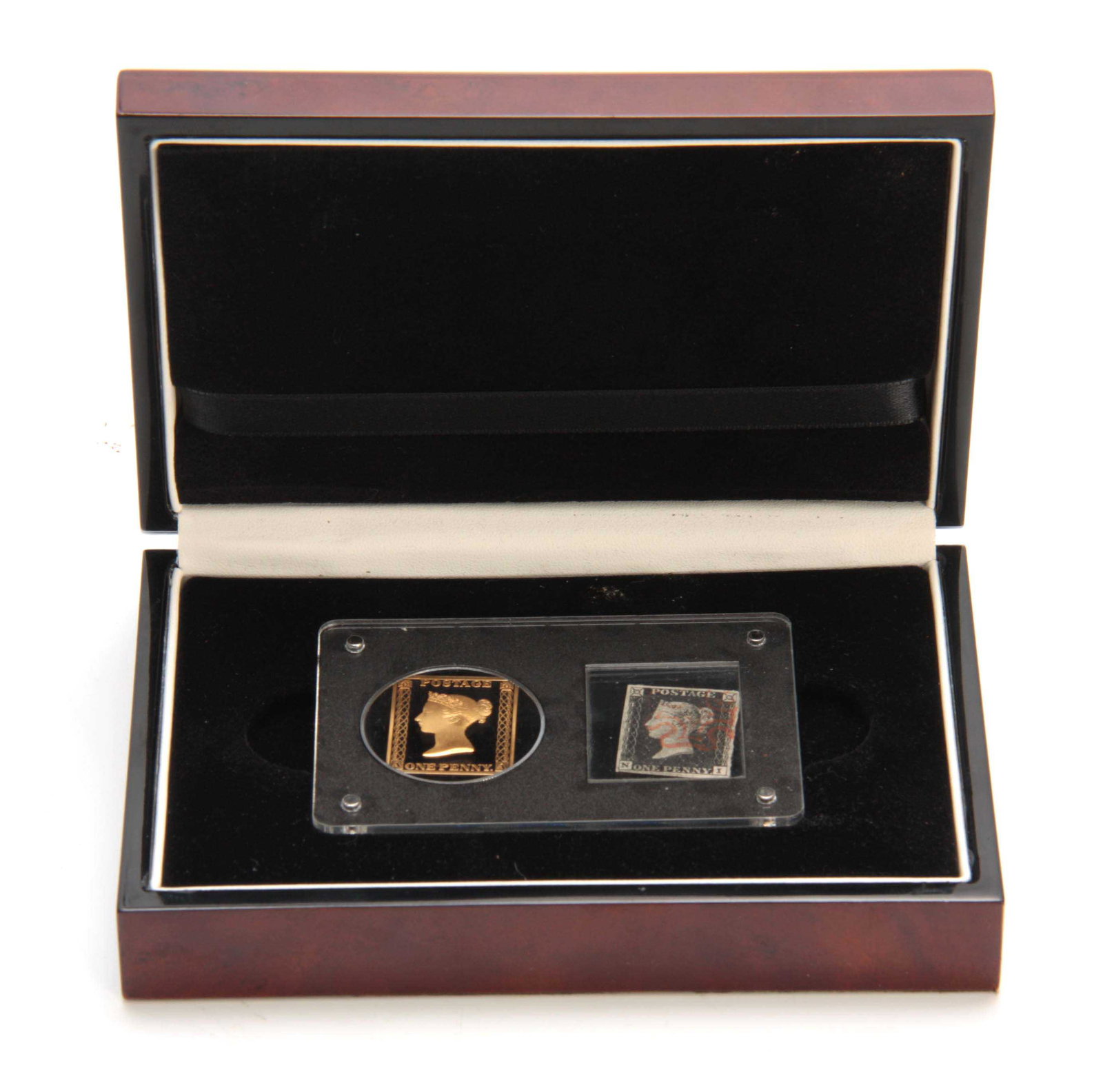 A CASED 1OZ GOLD PENNY BLACK COMMEMORATIVE COIN: A CASED 1OZ GOLD PENNY BLACK COMMEMORATIVE COIN 175th-anniversary limited edition .999.24ct weight 31.103gms circa 2015