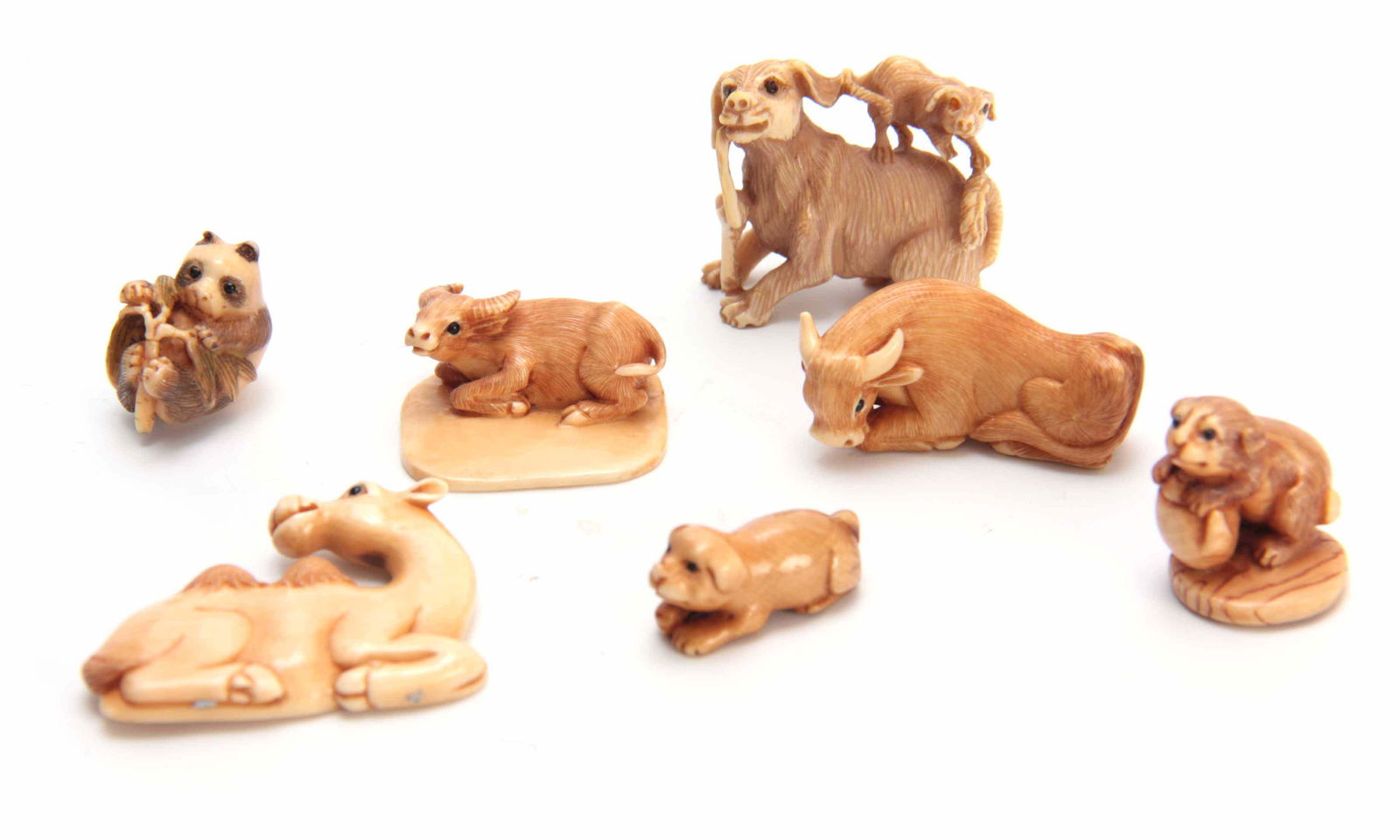 A COLLECTION OF SEVEN EARLY 20TH CENTURY IVORY NET (1 of 1)