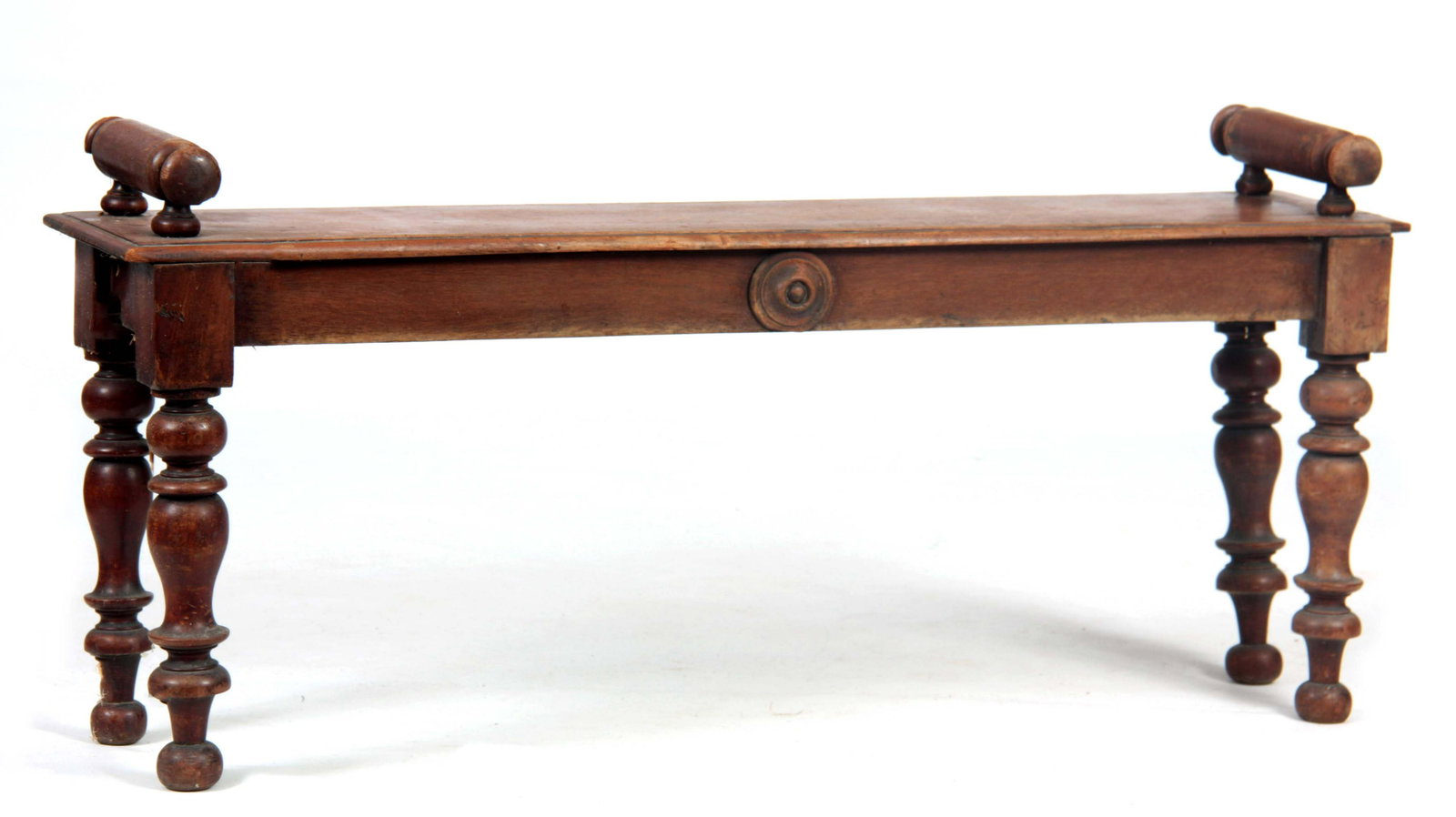 A VICTORIAN SIMULATED MAHOGANY WINDOW SEAT with tu: A VICTORIAN SIMULATED MAHOGANY WINDOW SEAT with turned side handles and tapering legs centred by roundels 104cm wide 23cm deep 46cm high