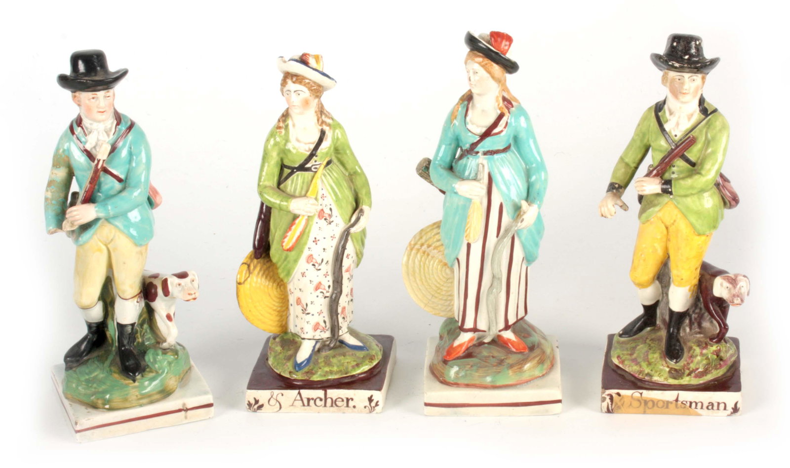 A PAIR OF 19TH CENTURY STAFFORDSHIRE STANDING FIGURES (1 of 1)