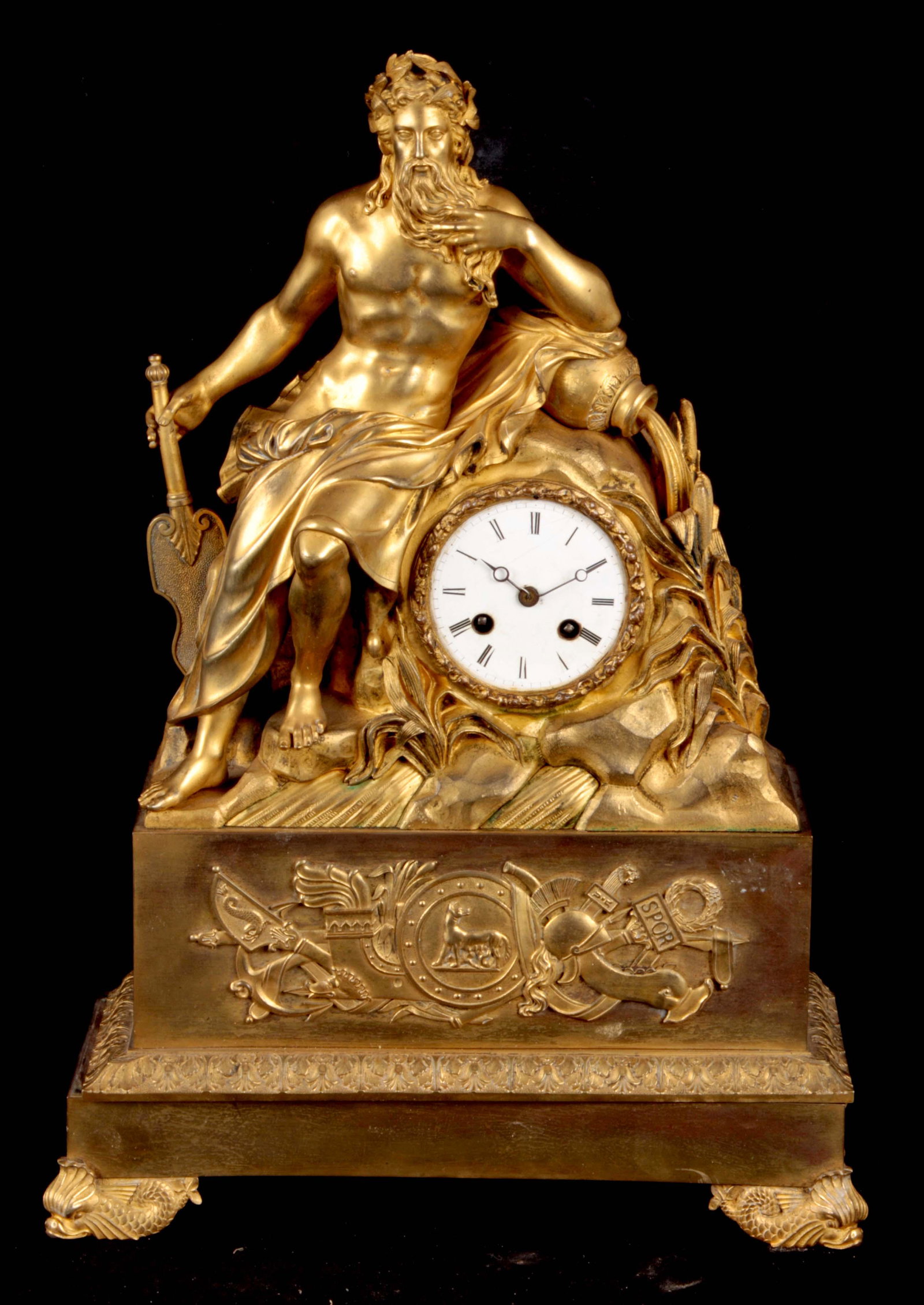 A LARGE 19TH CENTURY FRENCH ORMOLU FIGURAL MANTEL CLOCK: A LARGE 19TH CENTURY FRENCH ORMOLU FIGURAL MANTEL CLOCK the gilt bronze case surmounted by a semi-nude male holding a paddle representing a Greek river god leaning on a vase from which flows the river