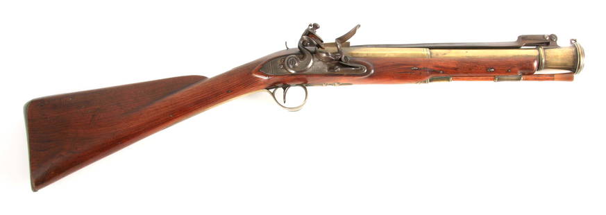 DAVID BLAIR. A GEORGE III BRASS BARRELLED FLINTLOCK: DAVID BLAIR. A GEORGE III BRASS BARRELLED FLINTLOCK BLUNDERBUSS WITH SPRUNG BAYONET, 14inch three-stage barrel with ring turned flared muzzle and top sprung bayonet, border engraved stepped and