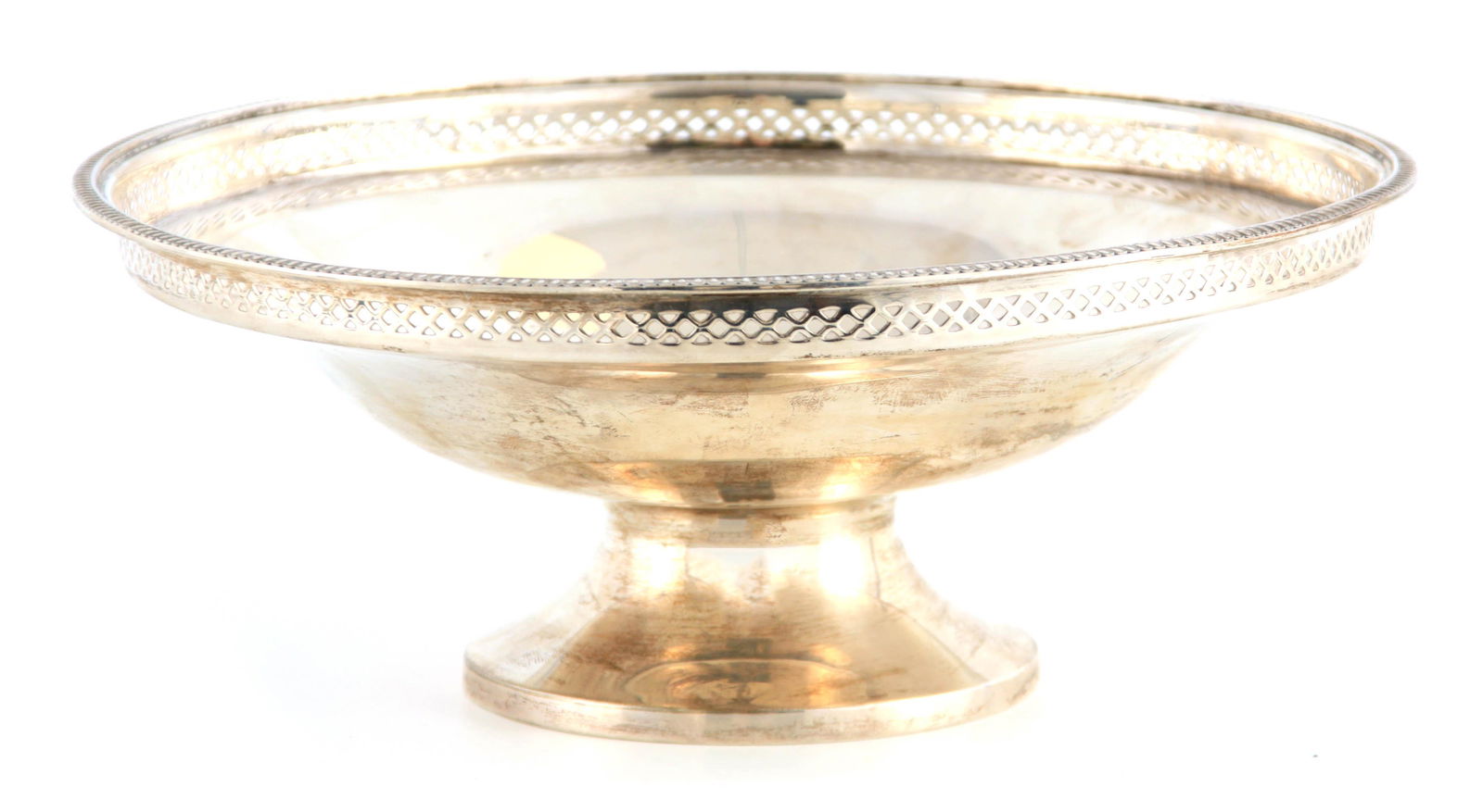 A SILVER FOOTED BOWL having pierced gallery on a: A SILVER FOOTED BOWL having pierced gallery on a circular foot 21cm diameter 8.5cm high app. weight 332g Mappin & Webb Sheffield 1936