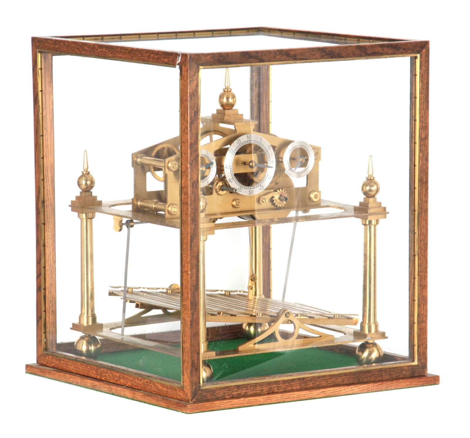A 20TH CENTURY CONGREVE ROLLING BALL CLOCK having a: A 20TH CENTURY CONGREVE ROLLING BALL CLOCK having a triangular pediment supported on four tapering pillars with three silvered chapter rings for hours minutes and seconds fronting a skeletonised fusee